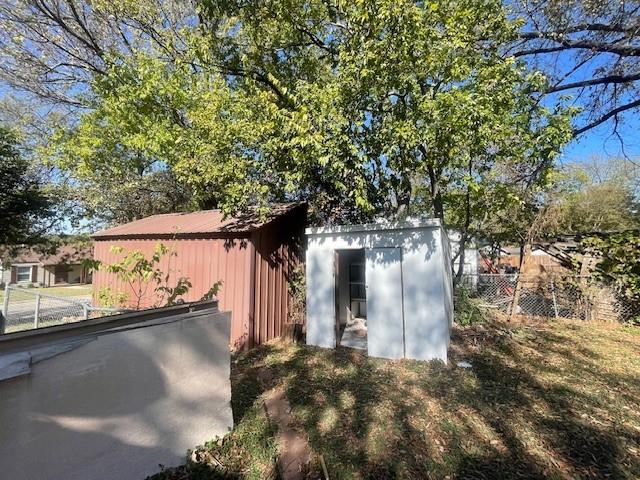 7428 Gaston Avenue Fort Worth, TX 76116 - Photo 5 of 17 a view of a house with a tree