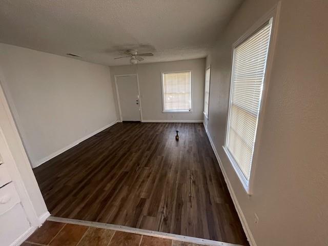 7428 Gaston Avenue Fort Worth, TX 76116 - Photo 8 of 17 a view of wooden floor in a room