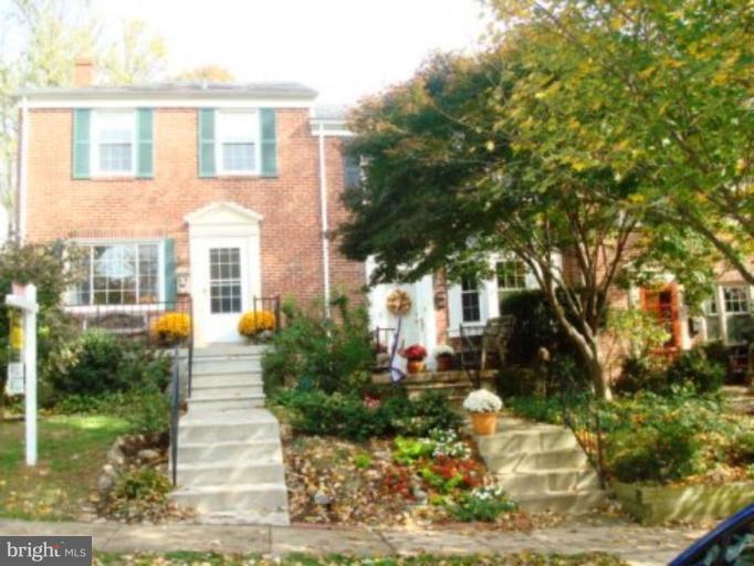 7209 Lanark Road Baltimore, MD 21212 - Photo 11 of 15 a front view of a house with garden