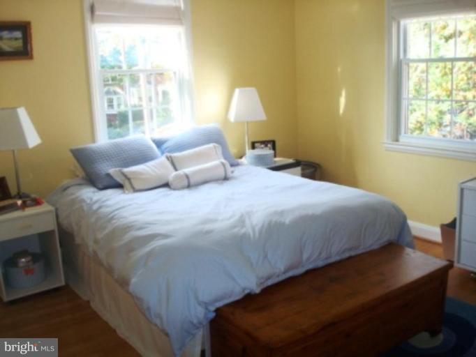 7209 Lanark Road Baltimore, MD 21212 - Photo 14 of 15 a bedroom with a bed and a window