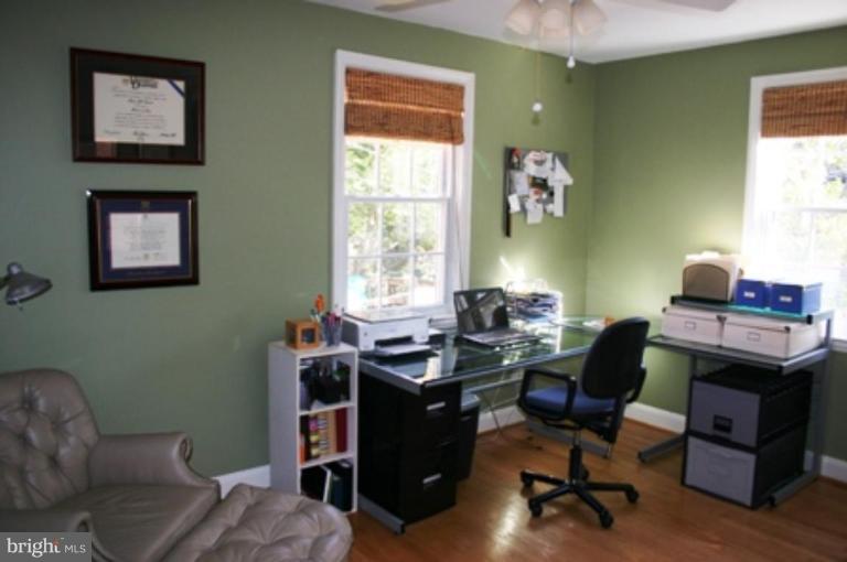 7209 Lanark Road Baltimore, MD 21212 - Photo 5 of 15 a view of a workspace with furniture and a window