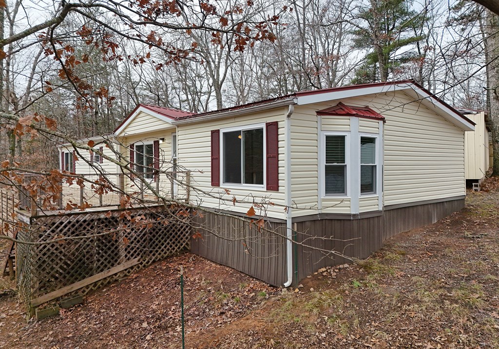 85 Truelove Road Blairsville, GA 30512 - Photo 2 of 35 a view of house with backyard and deck