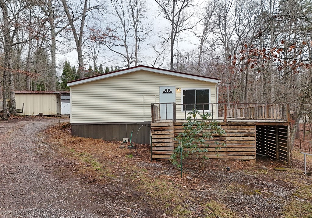 85 Truelove Road Blairsville, GA 30512 - Photo 3 of 35 a front view of house with yard and trees in the background
