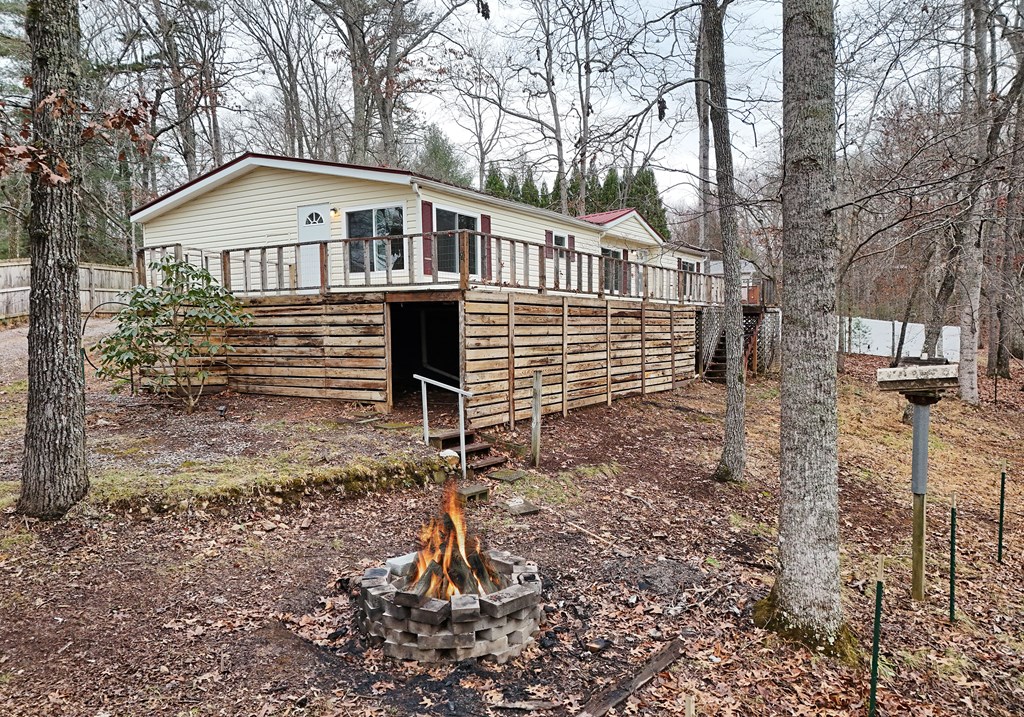 85 Truelove Road Blairsville, GA 30512 - Photo 32 of 35 a front view of a house with a yard and garage