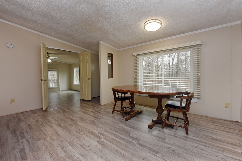 85 Truelove Road Blairsville, GA 30512 - Photo 8 of 35 a view of a livingroom with furniture and a window