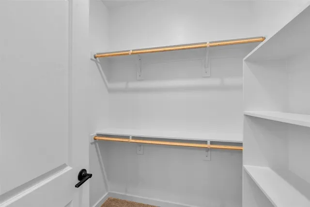a view of small space with racks on the wall