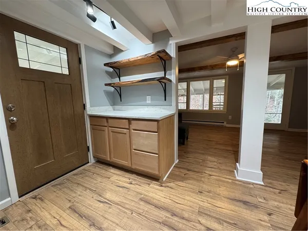 a kitchen with a sink and cabinets