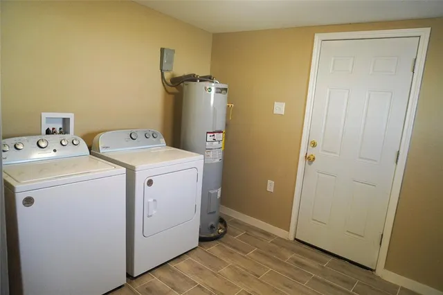 a utility room with dryer and washer