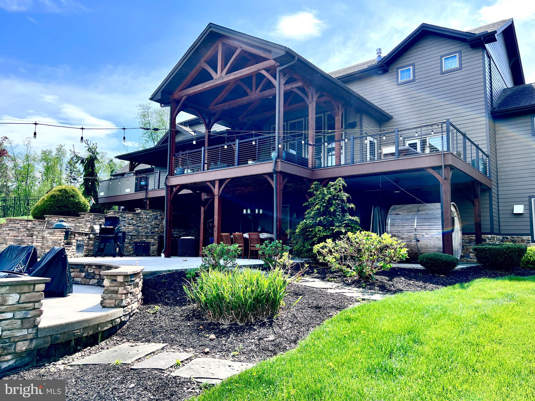173 Jumper Road Newburg, PA 17240 - Photo 5 of 5 a view of a house with a yard potted plants and a table