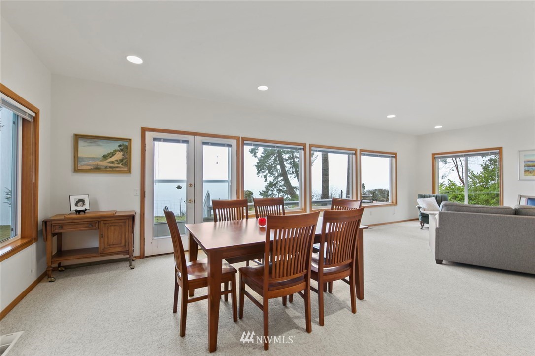 200 East Sund Road Grapeview, WA 98546 - Photo 12 of 40 a dining room with furniture and window