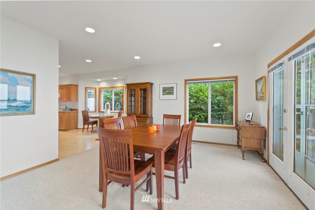 200 East Sund Road Grapeview, WA 98546 - Photo 18 of 40 a dining room with furniture and window