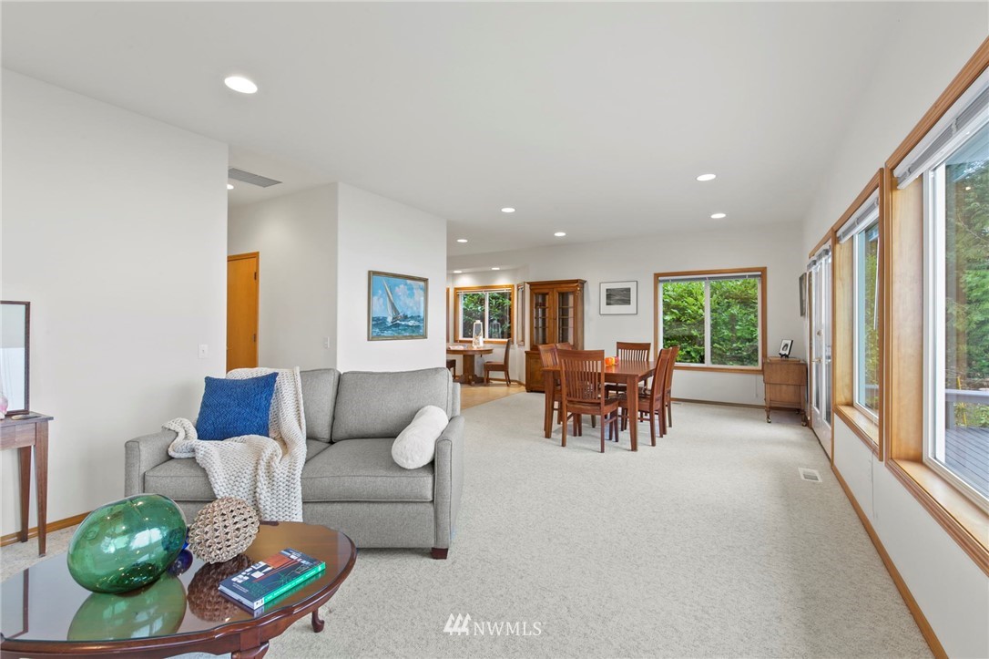 200 East Sund Road Grapeview, WA 98546 - Photo 19 of 40 a living room with furniture and a table