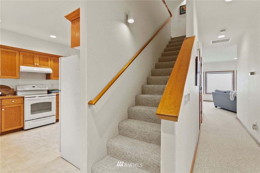 200 East Sund Road Grapeview, WA 98546 - Photo 22 of 40 a view of kitchen and wooden floor
