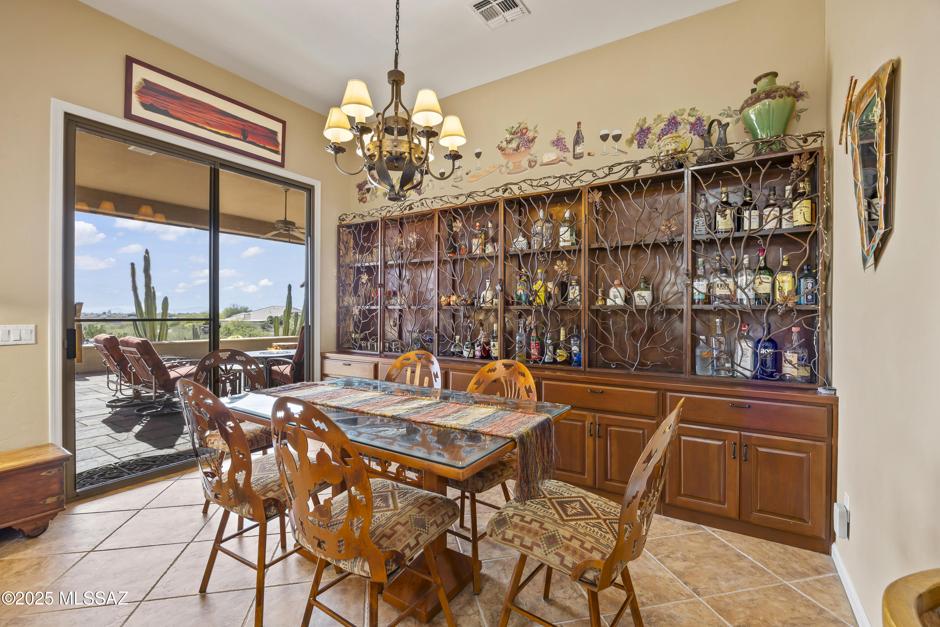 62893 East Flower Ridge Drive Tucson, AZ 85739 - Photo 20 of 49 Custom Built-In cabinitry in dining area, off patio.