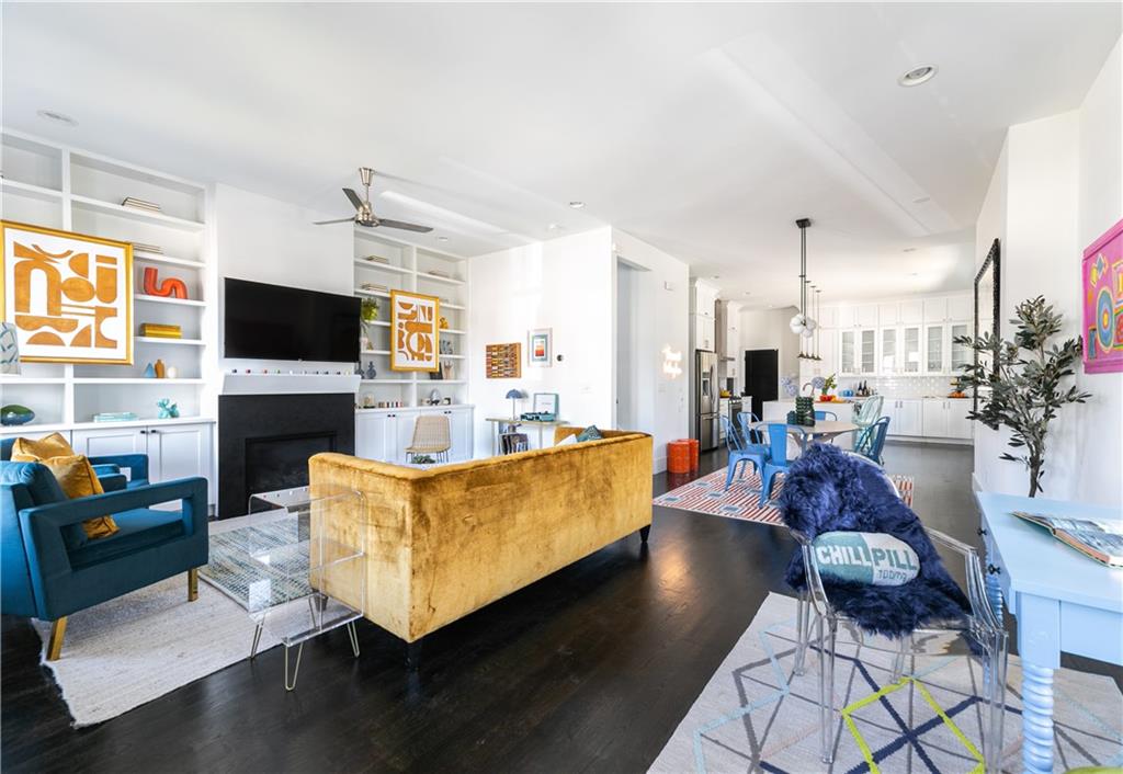 1085 Hardee Street Northeast, Unit A Atlanta, GA 30307 - Photo 11 of 32 a living room with fireplace furniture and a flat screen tv
