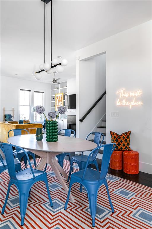 1085 Hardee Street Northeast, Unit A Atlanta, GA 30307 - Photo 13 of 32 a living room with furniture kitchen view and a chandelier