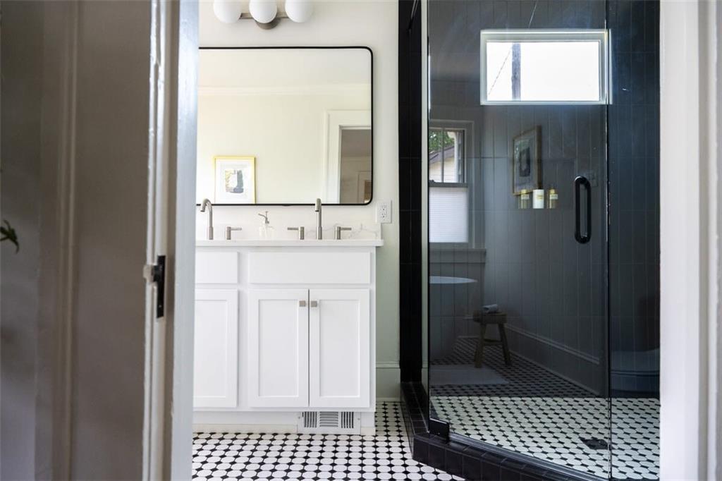 1085 Hardee Street Northeast, Unit A Atlanta, GA 30307 - Photo 14 of 32 a bathroom with a sink and a mirror