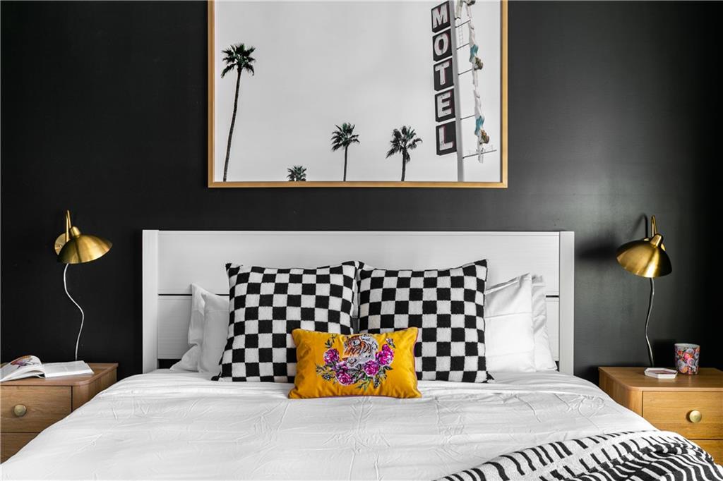 1085 Hardee Street Northeast, Unit A Atlanta, GA 30307 - Photo 23 of 32 a bathroom with a bathtub and mirror