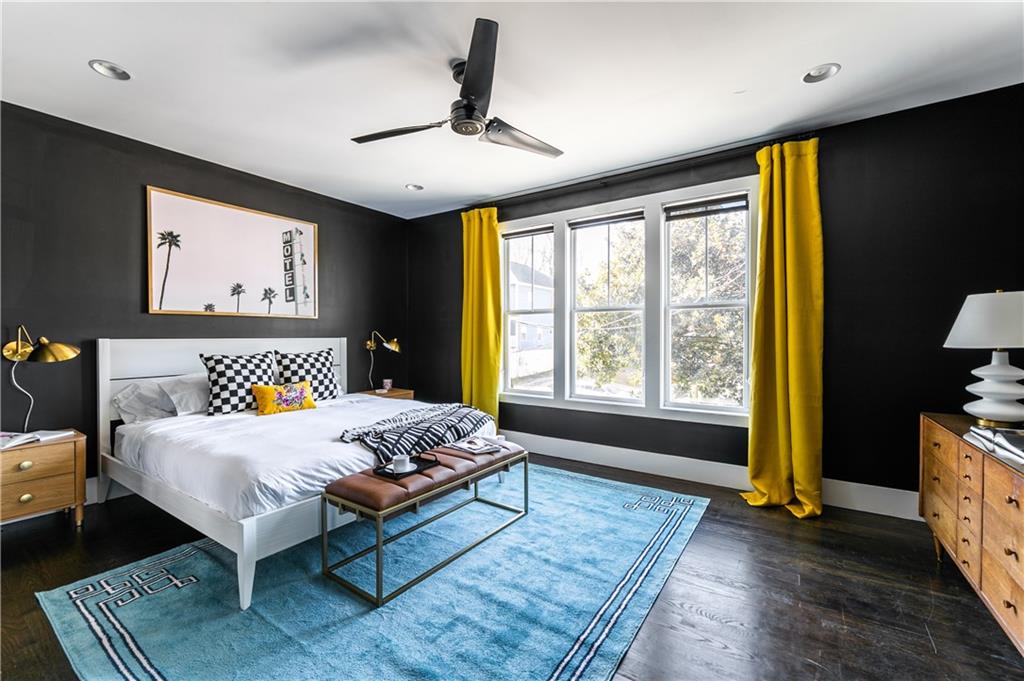 1085 Hardee Street Northeast, Unit A Atlanta, GA 30307 - Photo 3 of 32 a spacious bedroom with a bed and a window