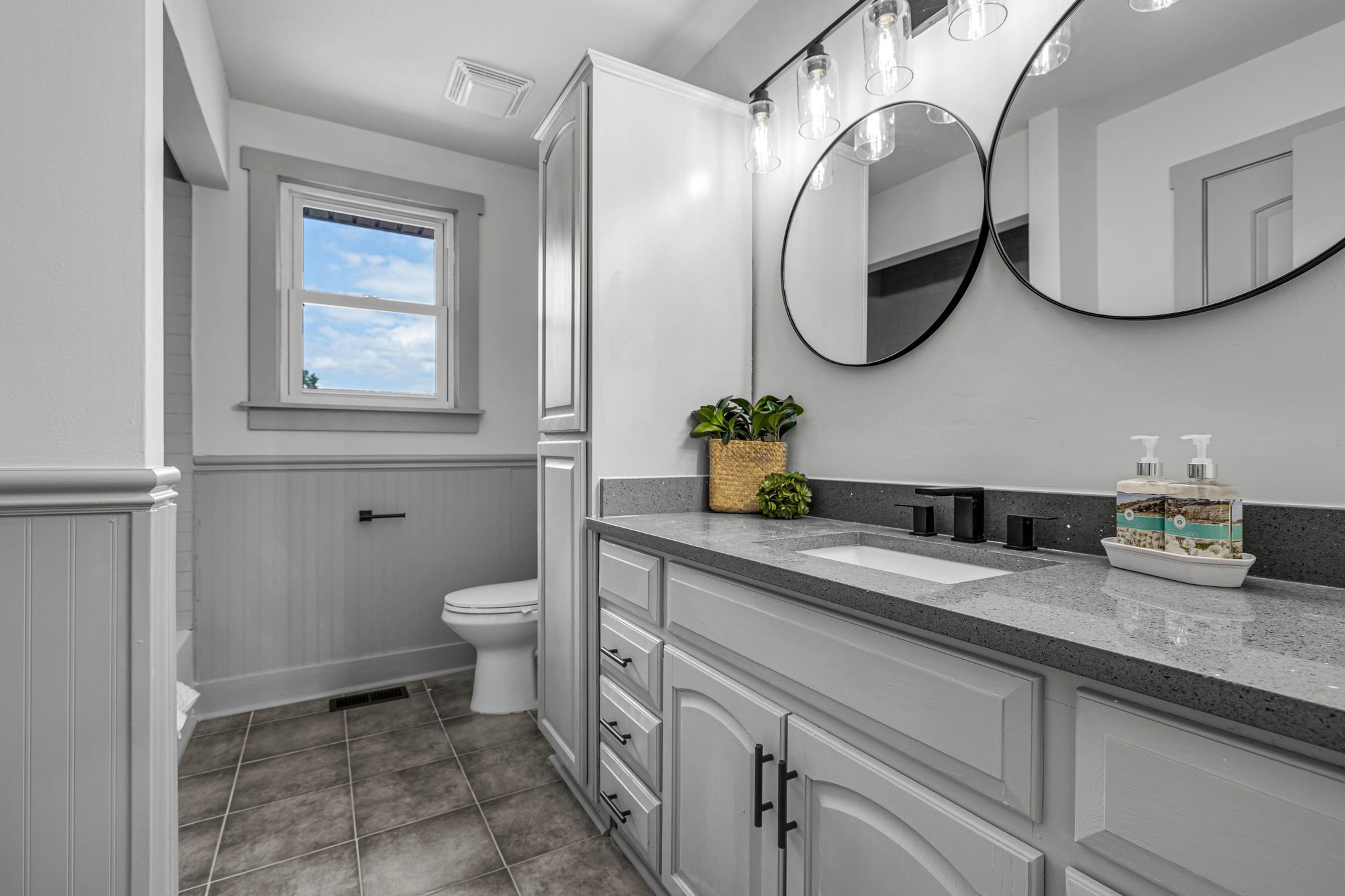 1177 Hamilton Chambers Road Lebanon, TN 37087 - Photo 24 of 42 a bathroom with a granite countertop toilet sink and mirror