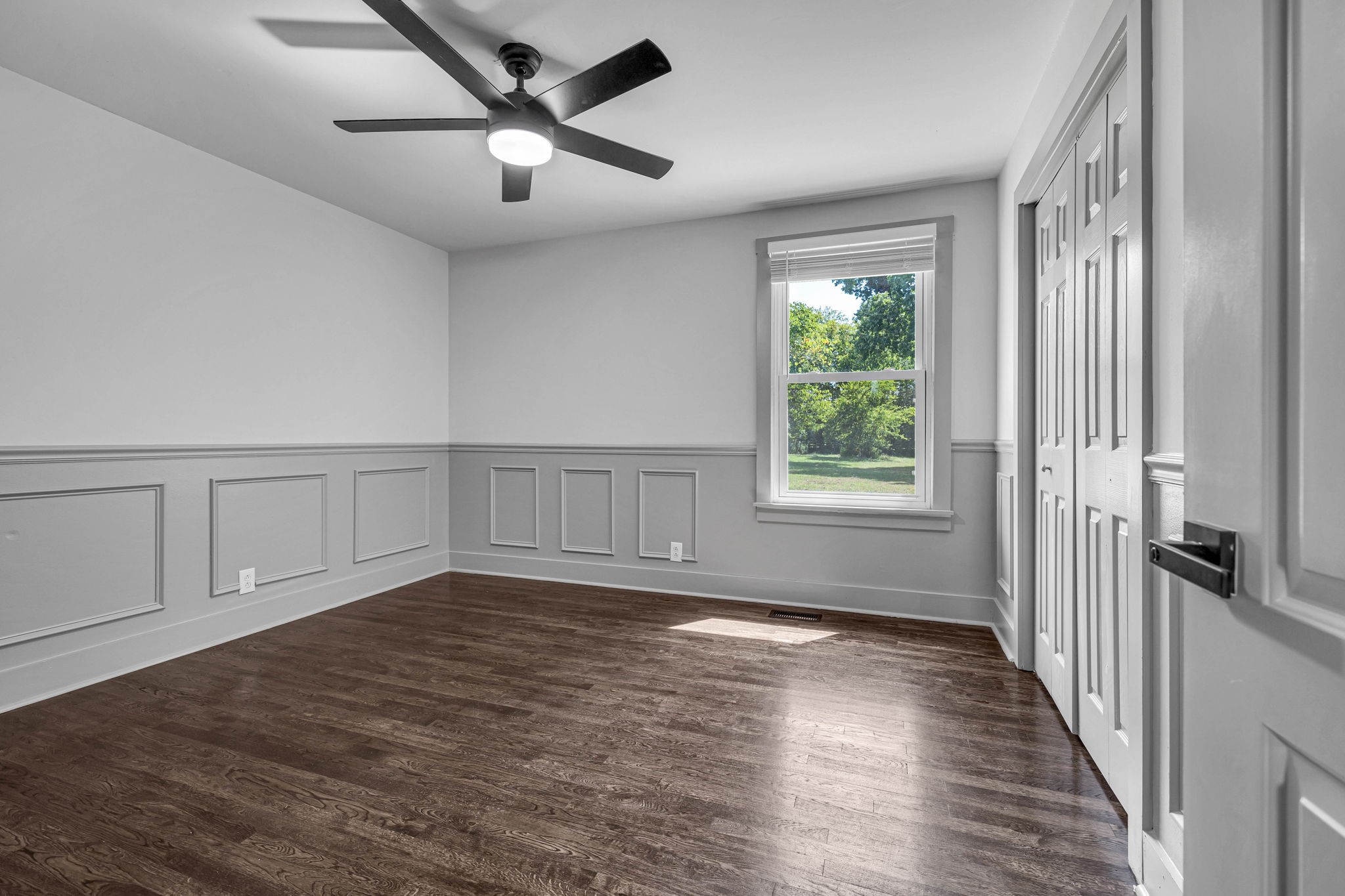1177 Hamilton Chambers Road Lebanon, TN 37087 - Photo 26 of 42 a view of an empty room with a window and wooden floor