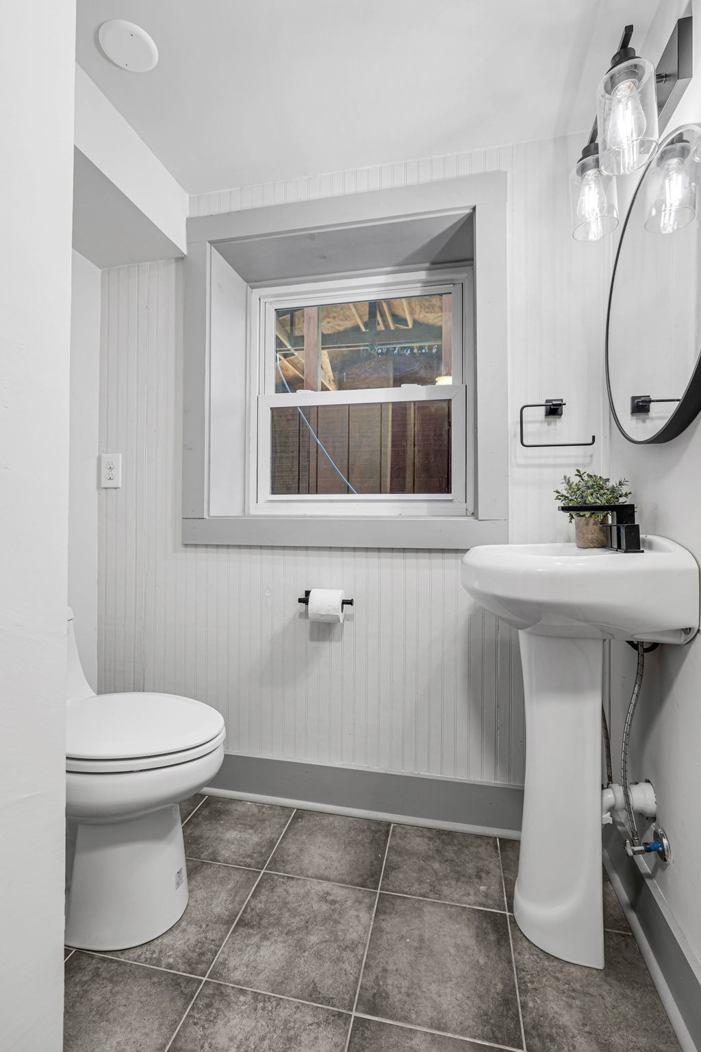 1177 Hamilton Chambers Road Lebanon, TN 37087 - Photo 33 of 42 a bathroom with a toilet sink and mirror