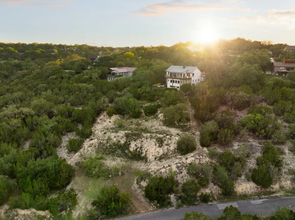 an aerial view of residential house with parking space