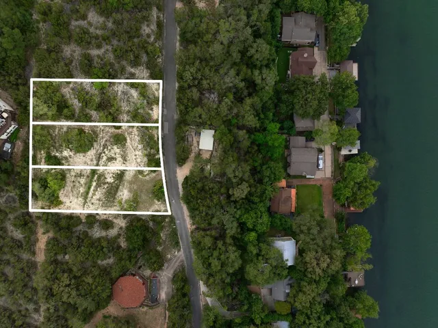 an aerial view of residential house with outdoor space