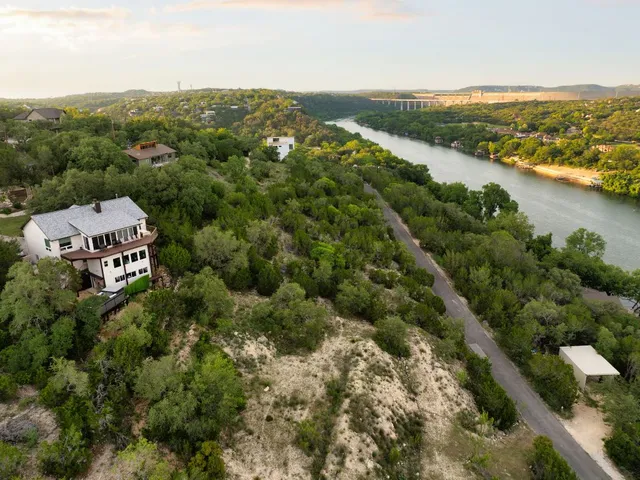 an aerial view of a houses with a outdoor space