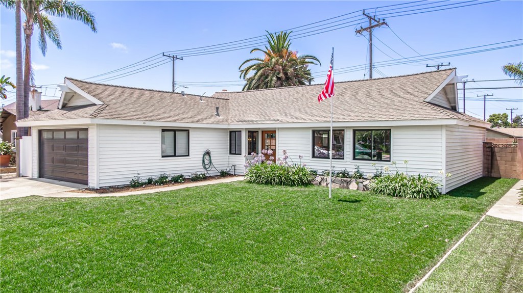 16401 Eagle Lane Huntington Beach, CA 92649 - Photo 1 of 1 a view of a house with a yard