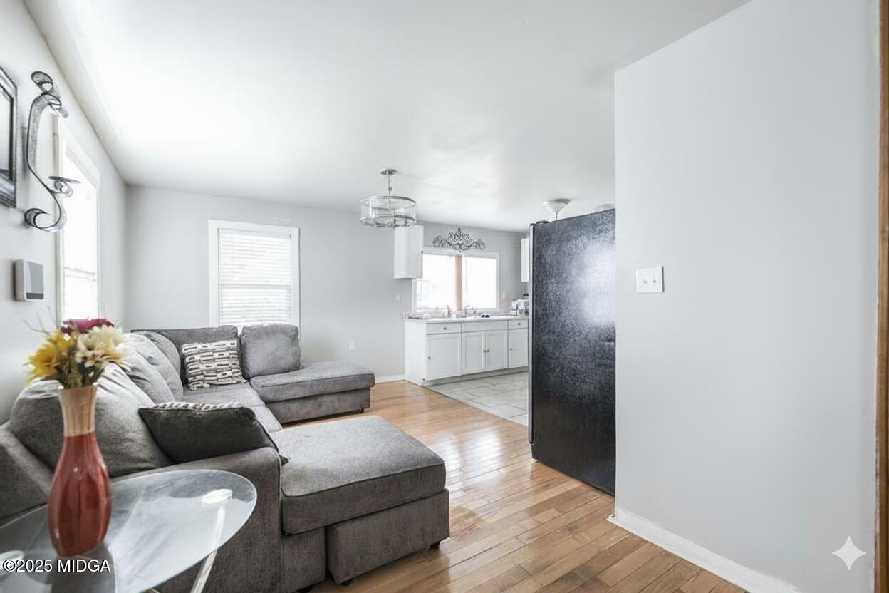511 Forsyth Street Montezuma, GA 31063 - Photo 5 of 12 a living room with furniture and a wooden floor