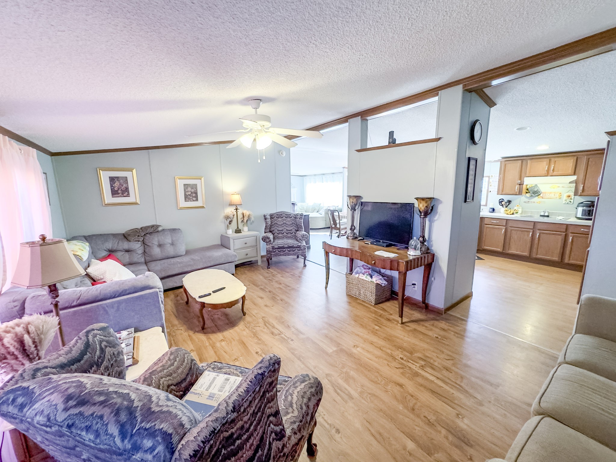 189 Pioneer Road Hohenwald, TN 38462 - Photo 11 of 20 a living room with furniture and wooden floor