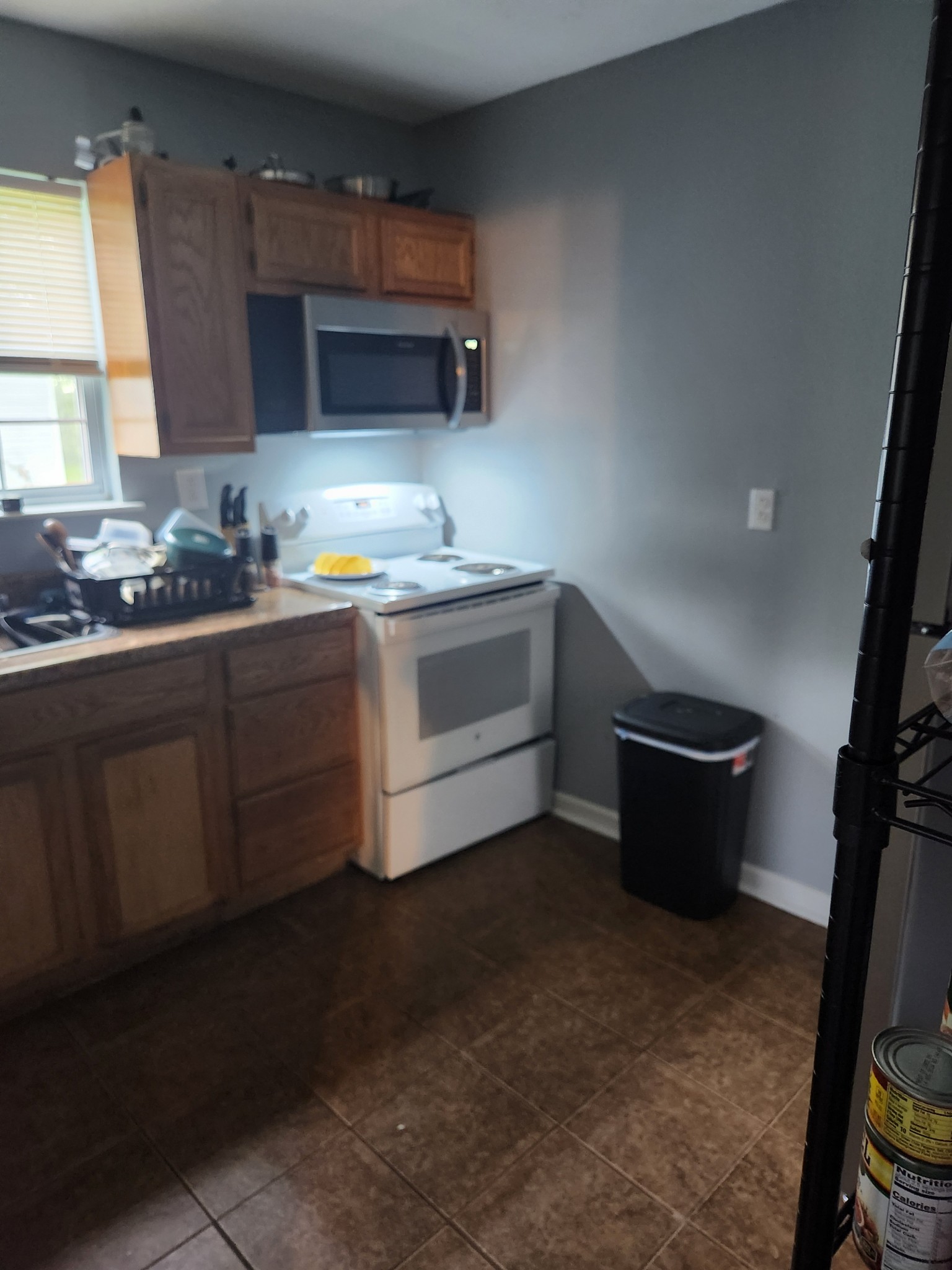 1261 Garton Road Burns, TN 37029 - Photo 11 of 11 a kitchen with a stove and a sink