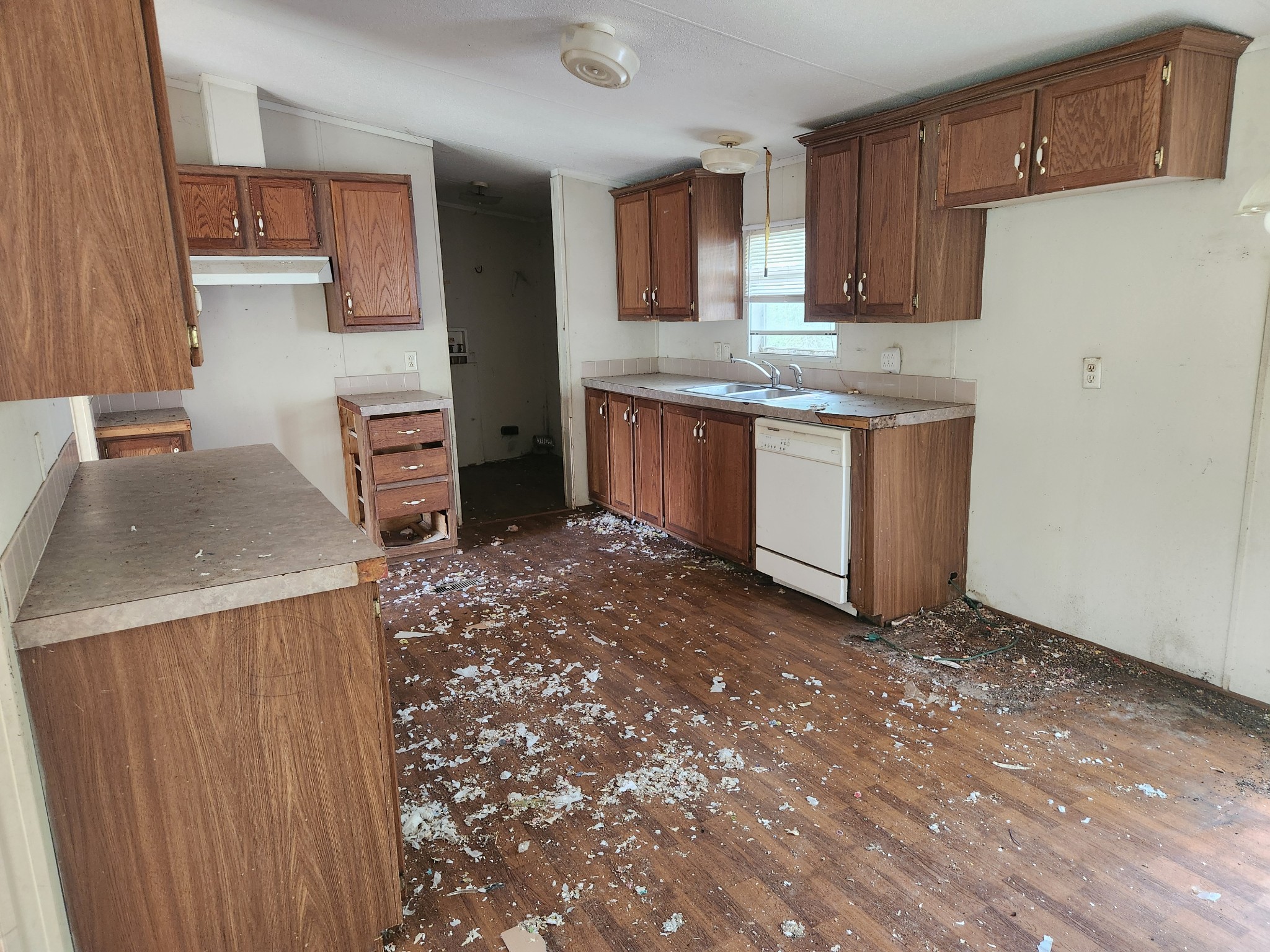 1261 Garton Road Burns, TN 37029 - Photo 5 of 11 a kitchen with stainless steel appliances granite countertop a sink stove and refrigerator