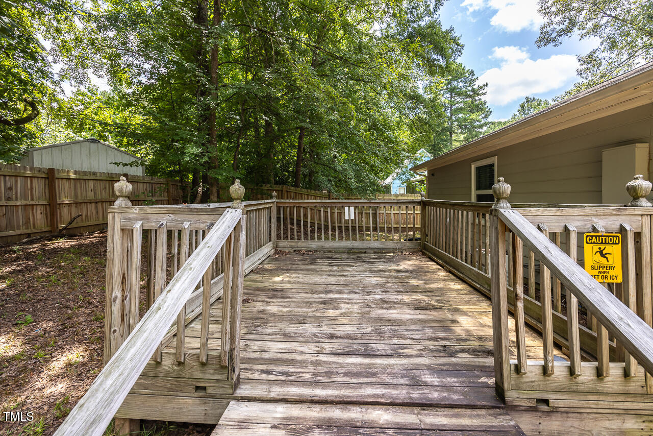 2906 Apollo Street Durham, NC 27704 - Photo 17 of 23 a view of entryway with wooden floor and fence