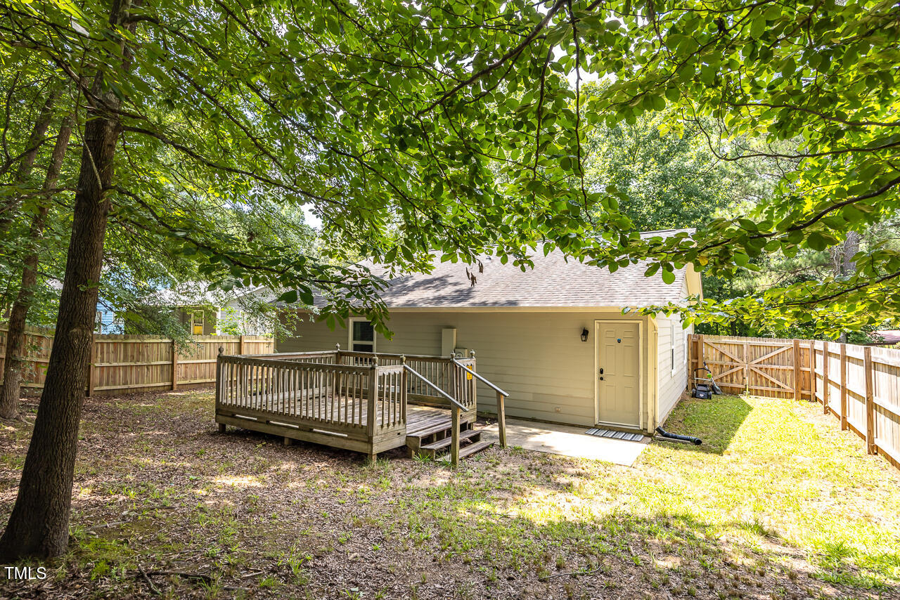2906 Apollo Street Durham, NC 27704 - Photo 20 of 23 a view of a room with wooden fence and trees