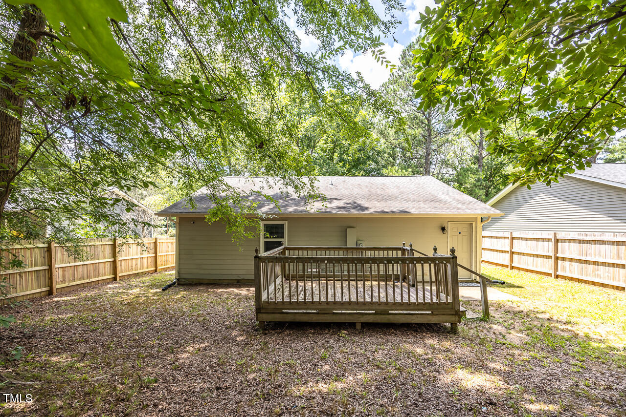 2906 Apollo Street Durham, NC 27704 - Photo 21 of 23 a view of a roof deck with a small cabin