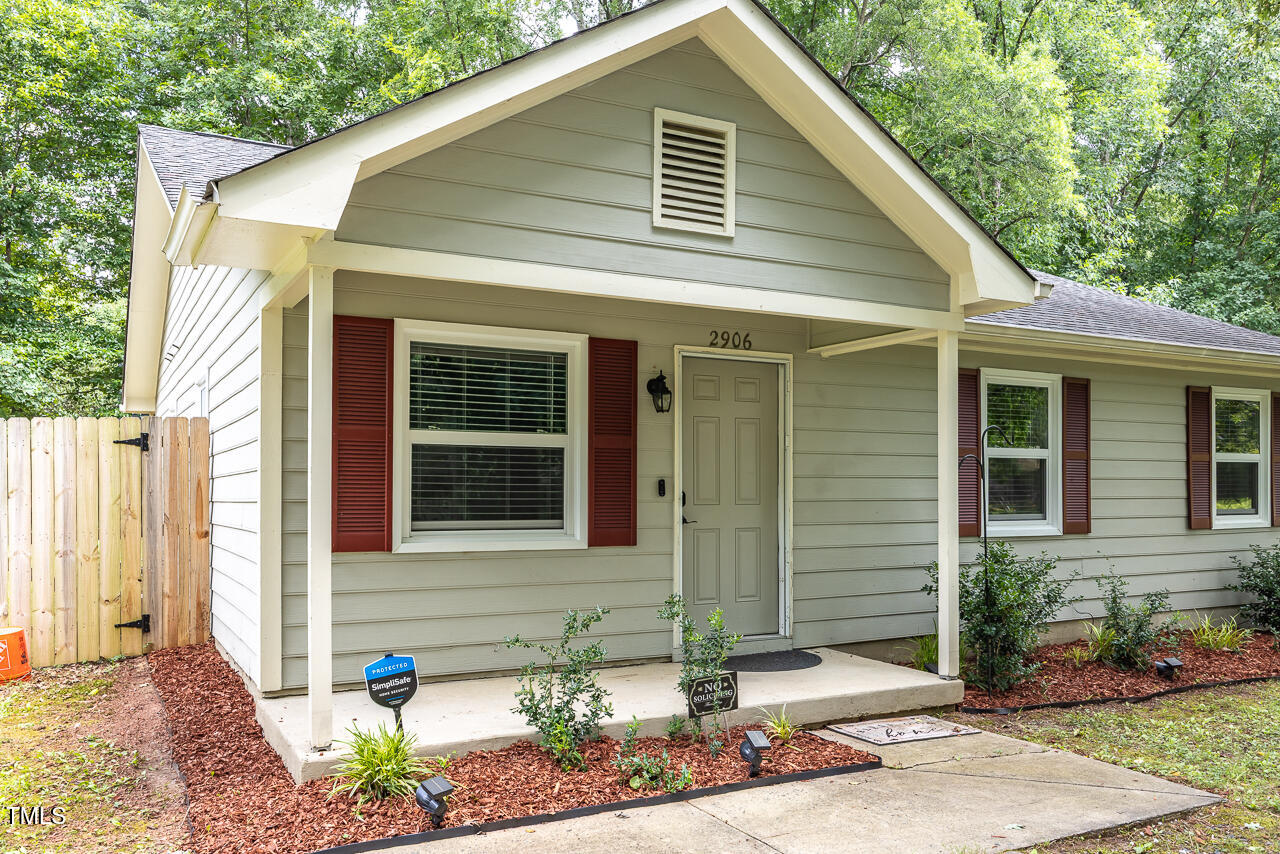 2906 Apollo Street Durham, NC 27704 - Photo 3 of 23 a front view of a house with a yard