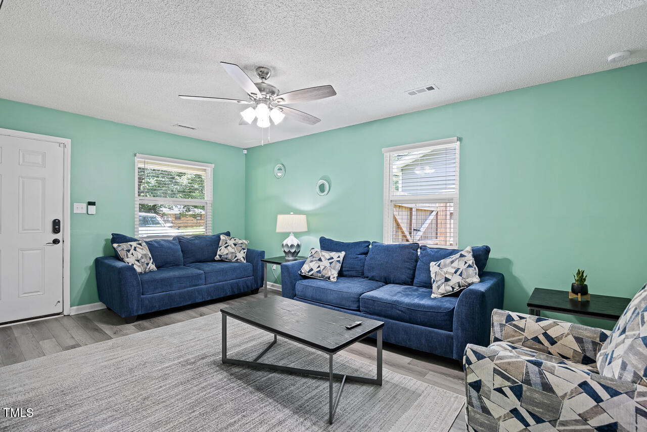 2906 Apollo Street Durham, NC 27704 - Photo 5 of 23 a living room with furniture and a window