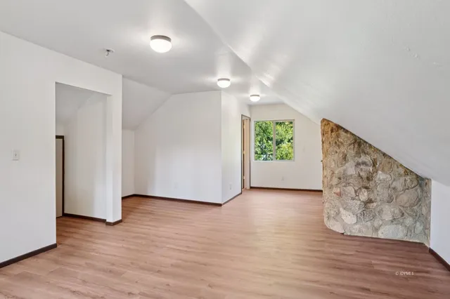 a view of livingroom with hardwood floor and window