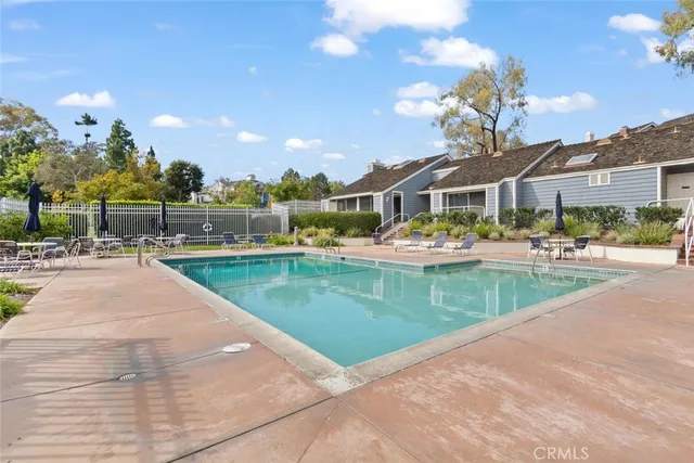 a view of a water fountain and a yard