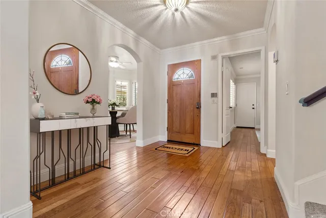 a view of a livingroom with furniture and wooden floor