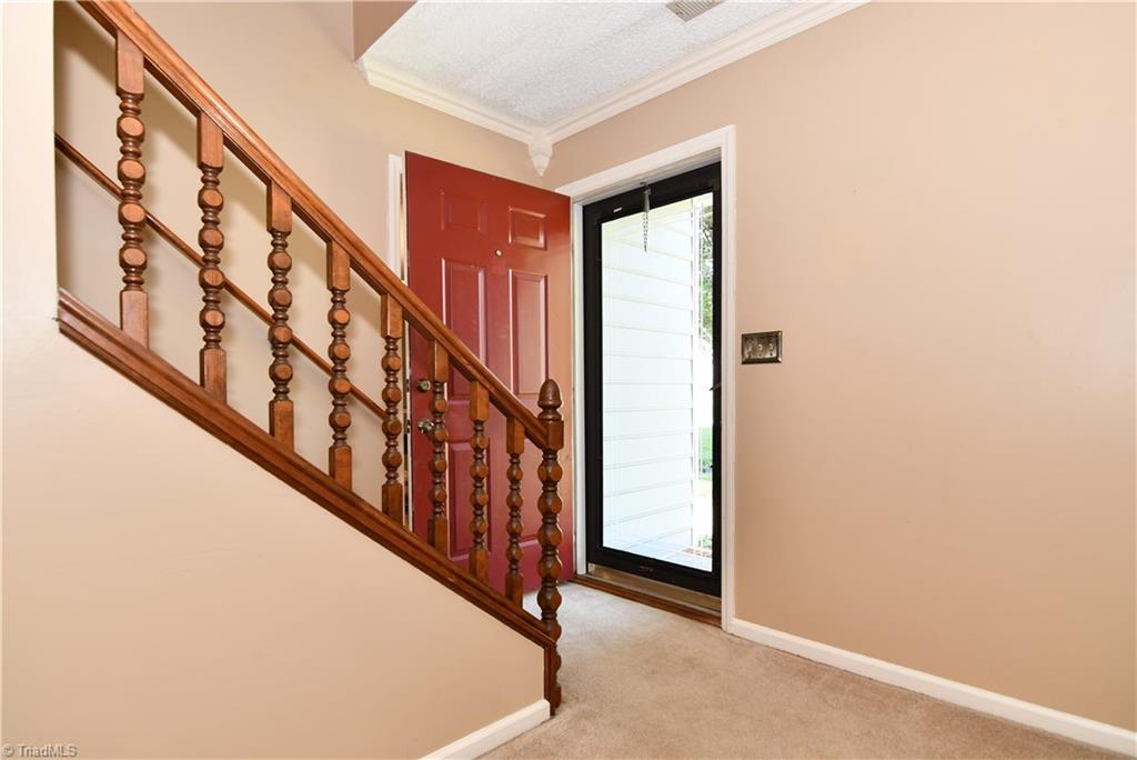 1104 Ridgecliff Drive Rural Hall, NC 27045 - Photo 4 of 28 There's a rocking chair front porch too! Come on in and enjoy this truly ready to move in home! Sparkling clean, new carpet in several rooms, carpets deep cleaned elsewhere.