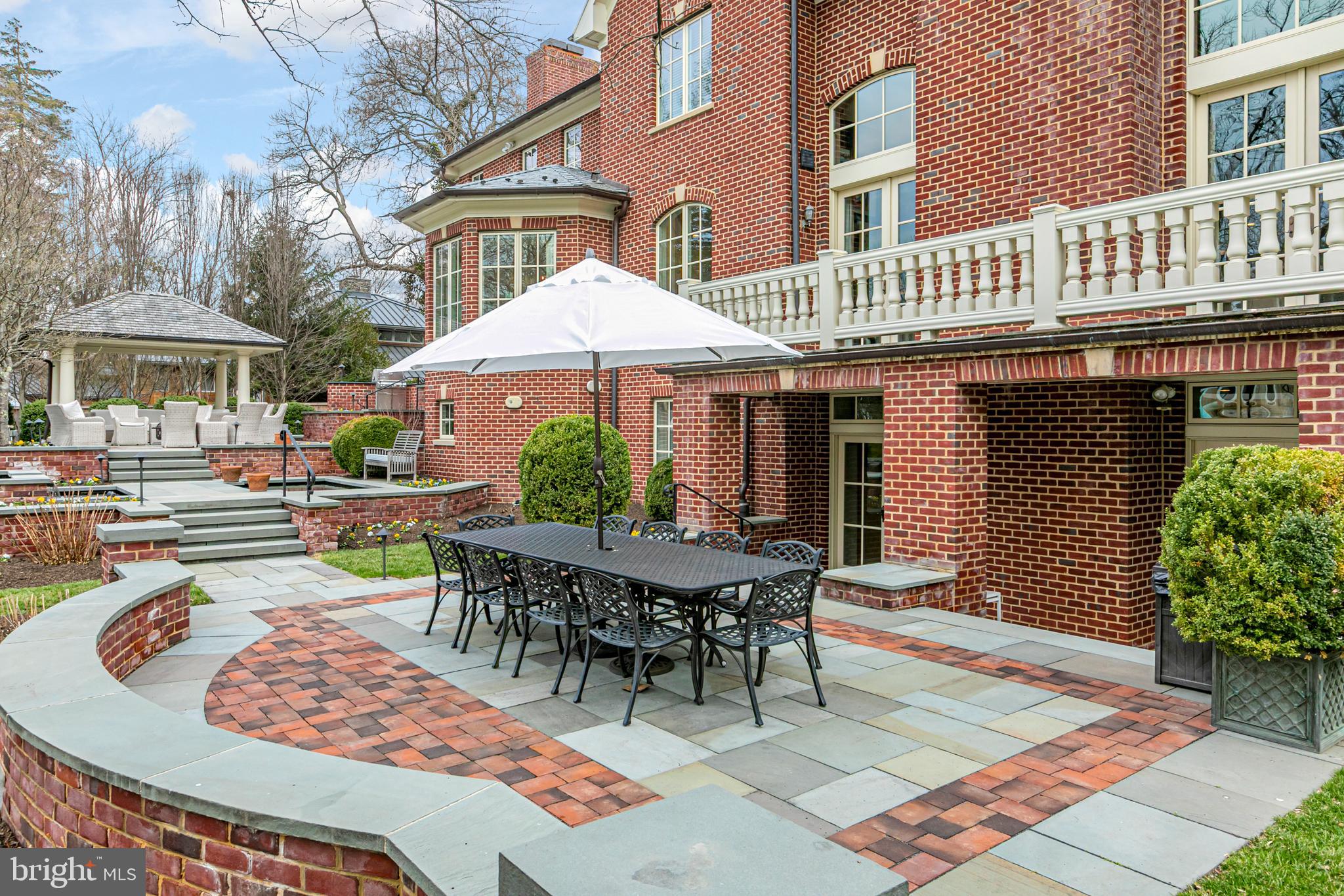 178 Library Place Princeton, NJ 08540 - Photo 39 of 45 a view of a patio with a table and chairs under an umbrella