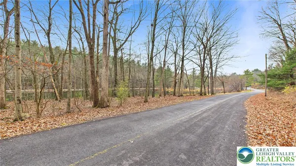 a view of road with trees