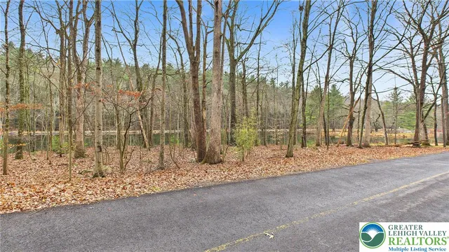 a view of balcony with wooden floor