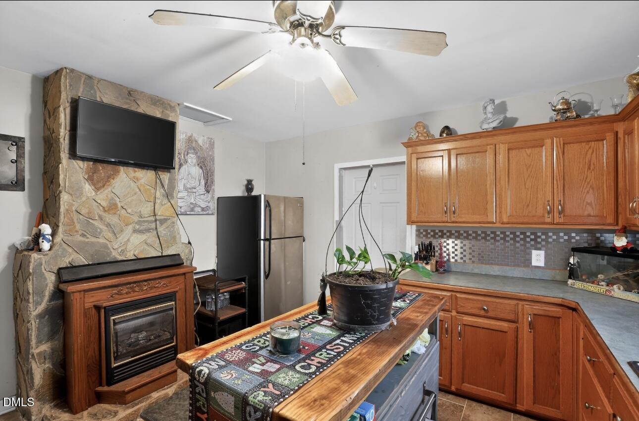 860 Virginia Road Marion, NC 28752 - Photo 11 of 23 a kitchen with stainless steel appliances granite countertop a refrigerator stove and sink