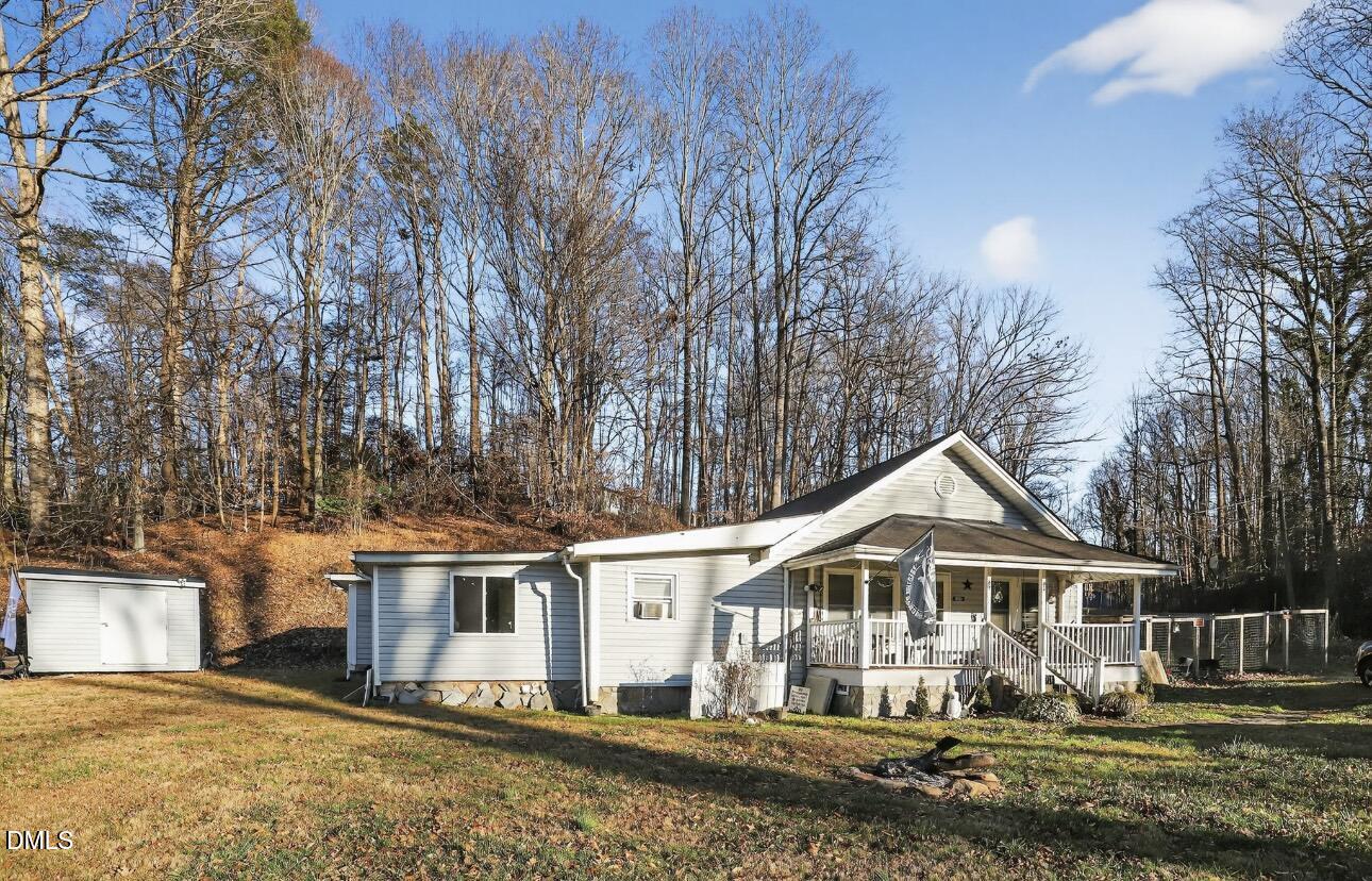 860 Virginia Road Marion, NC 28752 - Photo 2 of 23 front view of a house with a yard