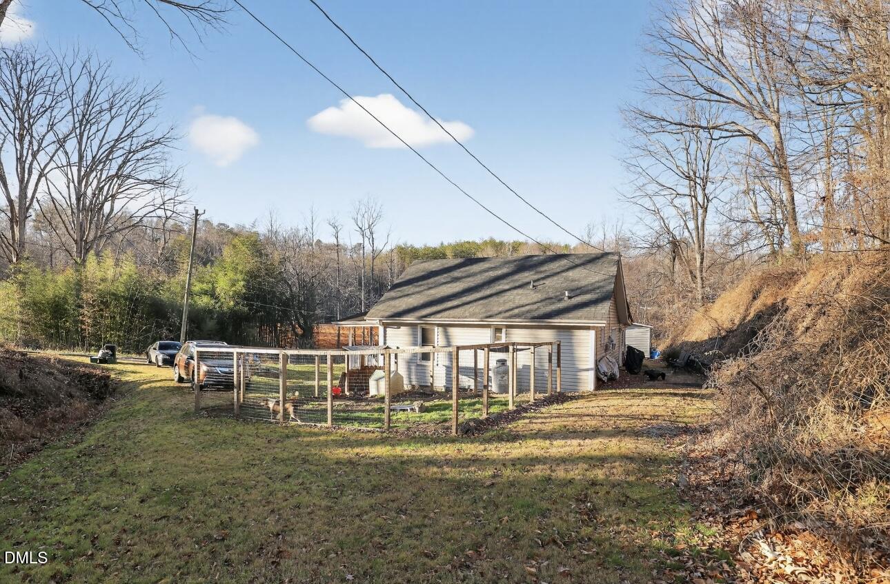 860 Virginia Road Marion, NC 28752 - Photo 5 of 23 a view of a house with backyard and sitting area