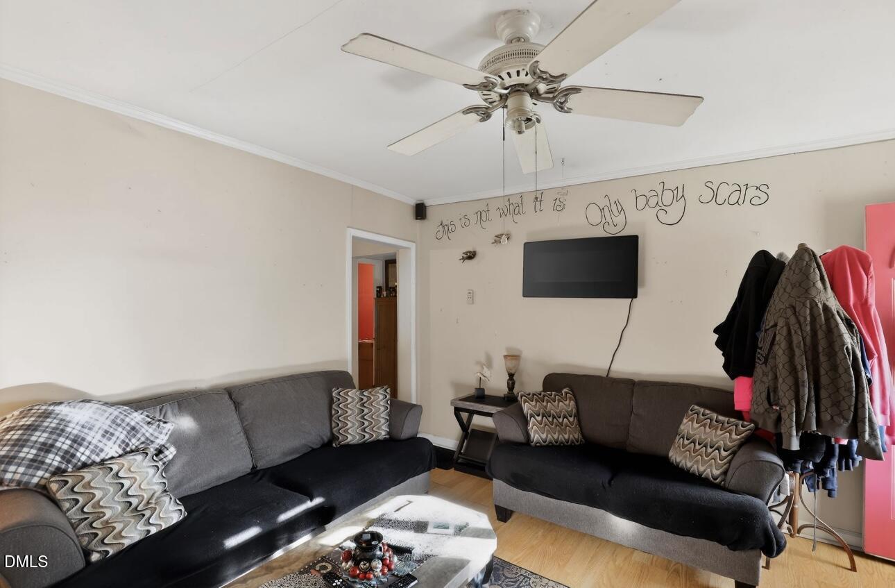 860 Virginia Road Marion, NC 28752 - Photo 9 of 23 a living room with furniture and a flat screen tv